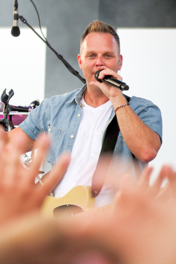 The energy is electric as Matthew West pours his heart into the microphone and strums his guitar with passion.