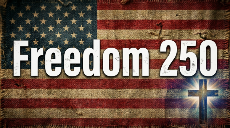 Worn American flag with text 'Patriot Freedom 250' hanging on wooden post